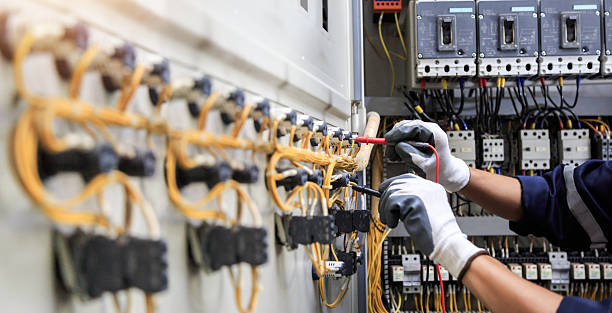 Professional Electrician technician working in Iowa City, IA